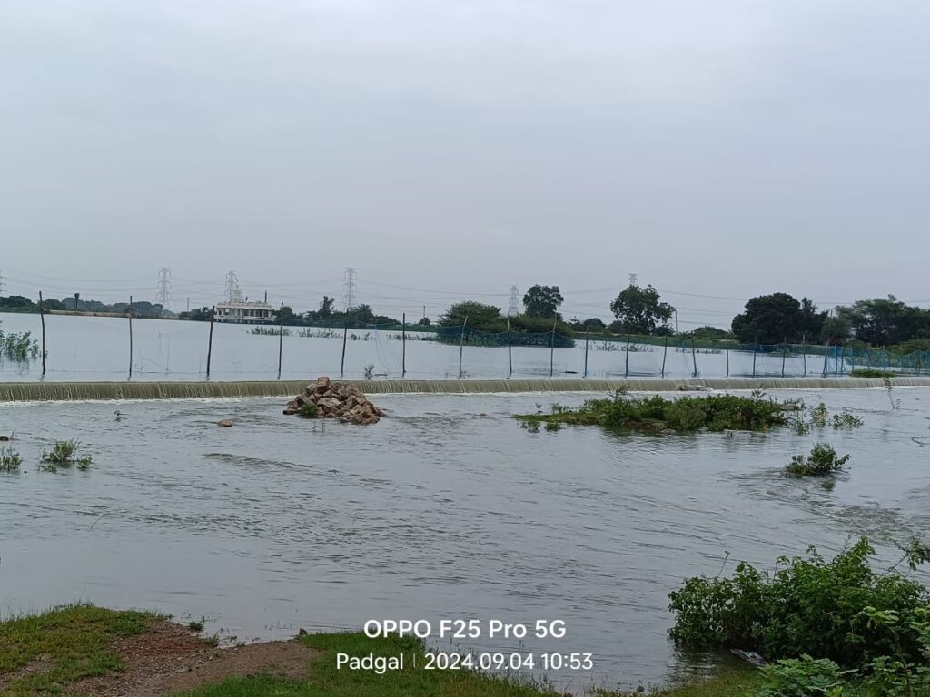 Flood flowing from the road near Pochampally Mutyalamma Temple